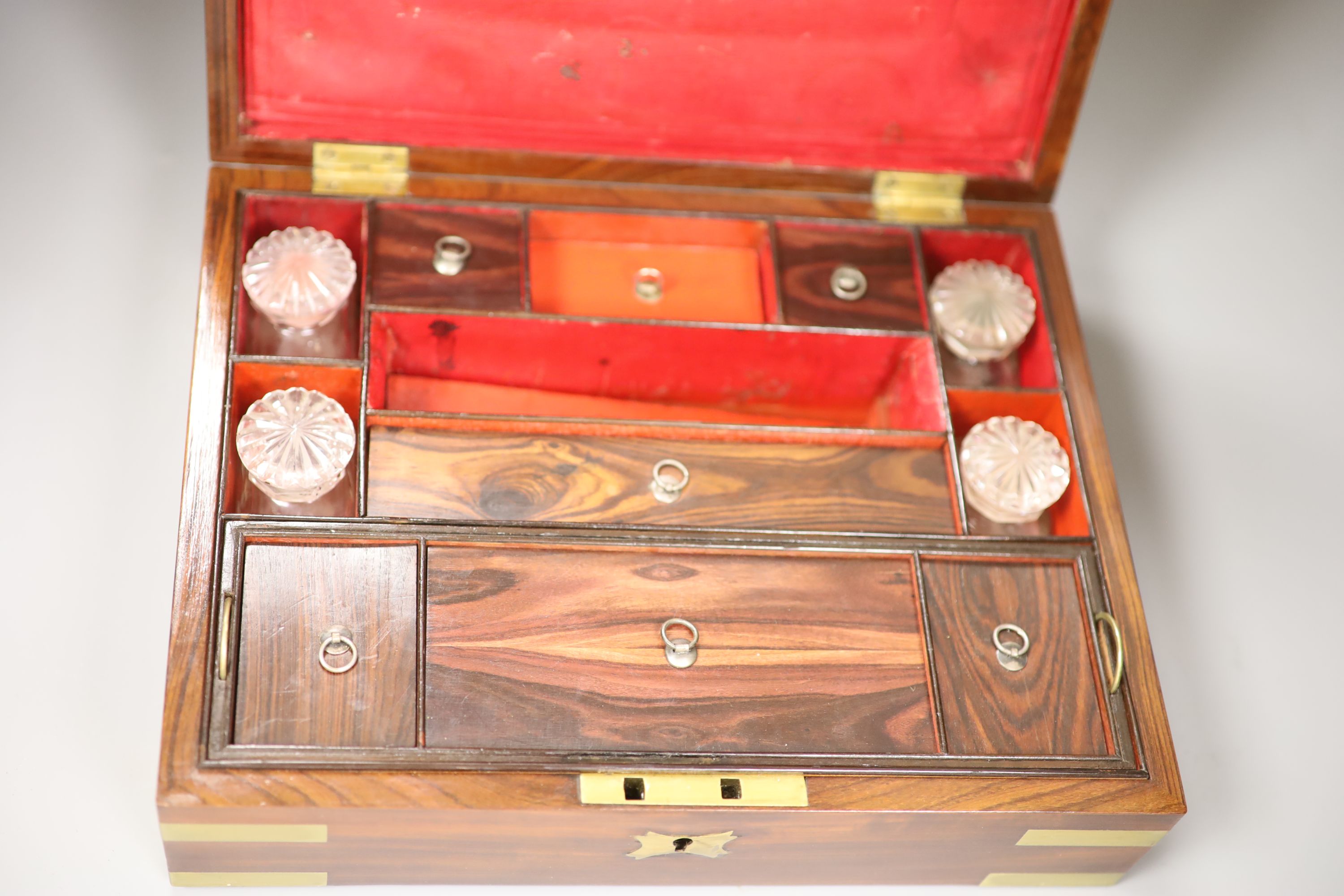 A George IV mahogany and brass vanity case, width 30cm